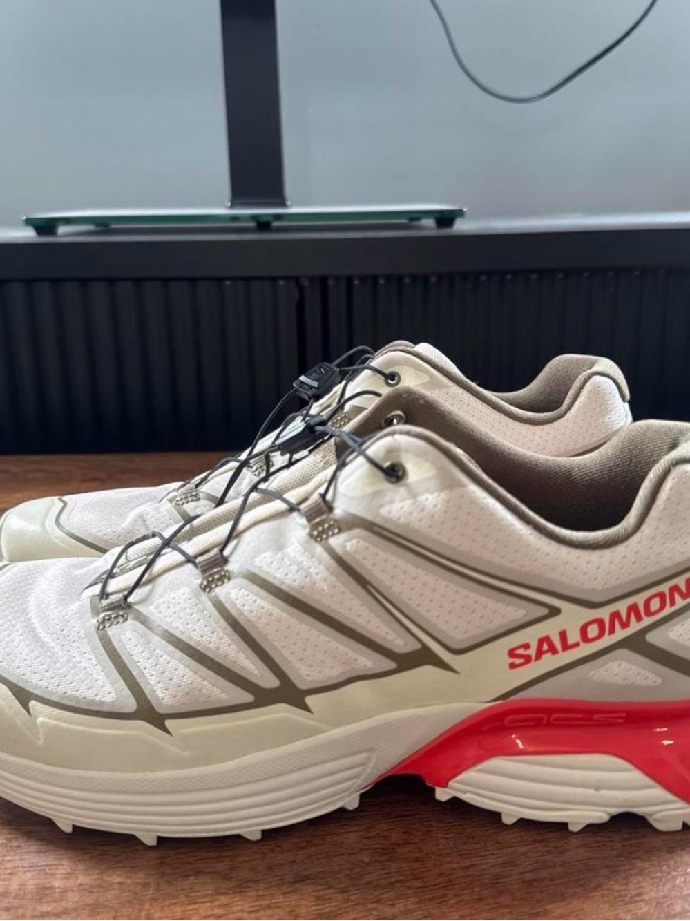 Salomon womens Beige and Red/orange Trail Running Shoes size 11.5 women’s